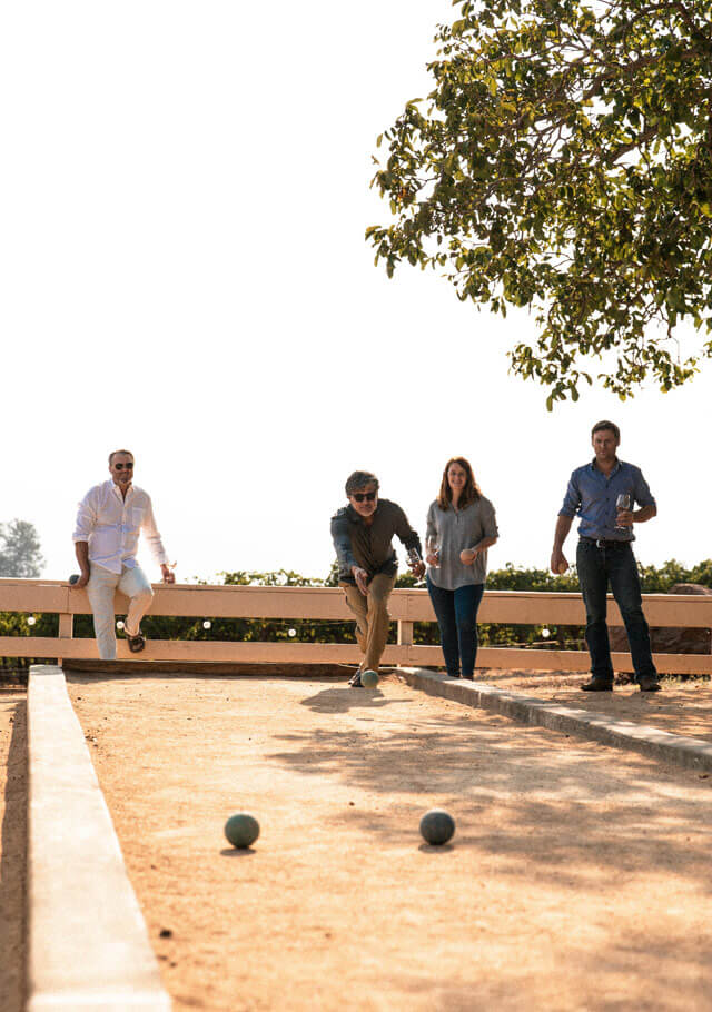 People playing bocce ball